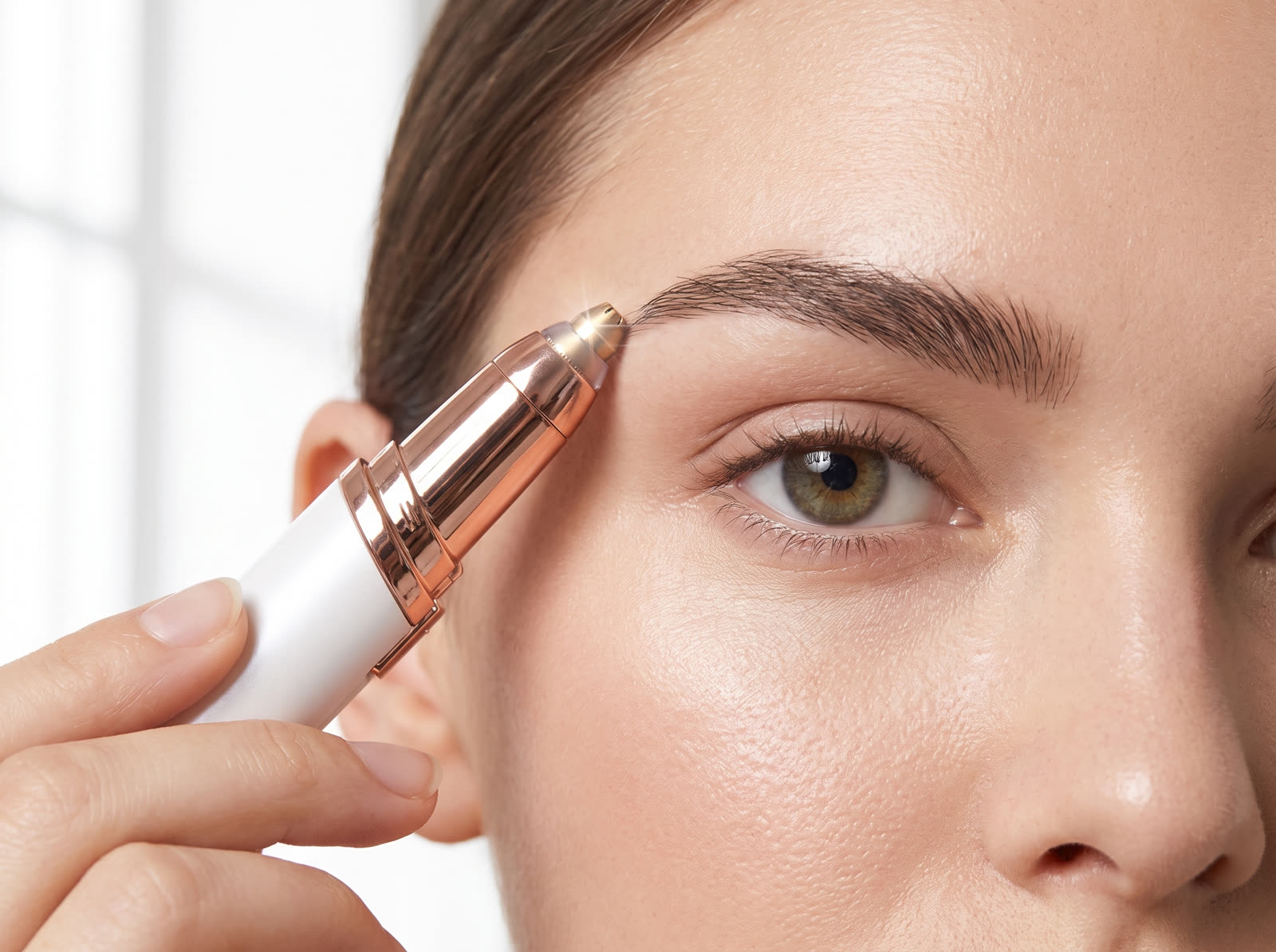Close-up of a perfectly groomed brow being finished with the Brow Pen